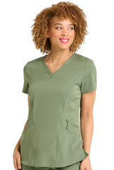 Stretch Damen Kasack in Olivenfarbe mit drei Hüfttaschen & V-Ausschnitt.