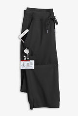 schwarze Stretch Damen Cargo Berufshose liegend mit Accessoires in den Taschen