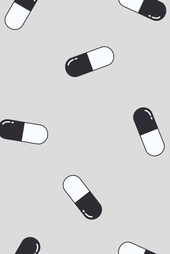 schwarz weiße Pillen auf grauem Hintergrund 